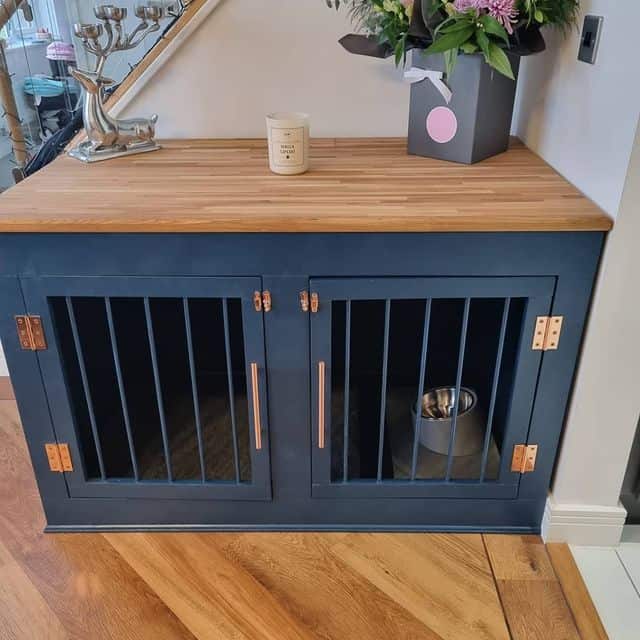 A blue-and-brown furniture-style, wooden dog crate