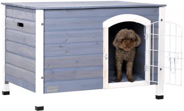 A dog inside a Petsfit Wooden Dog Crate with Wire Door