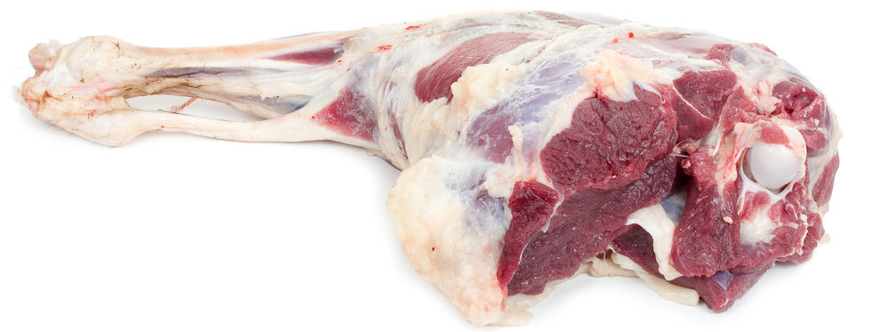 A raw lamb leg meat